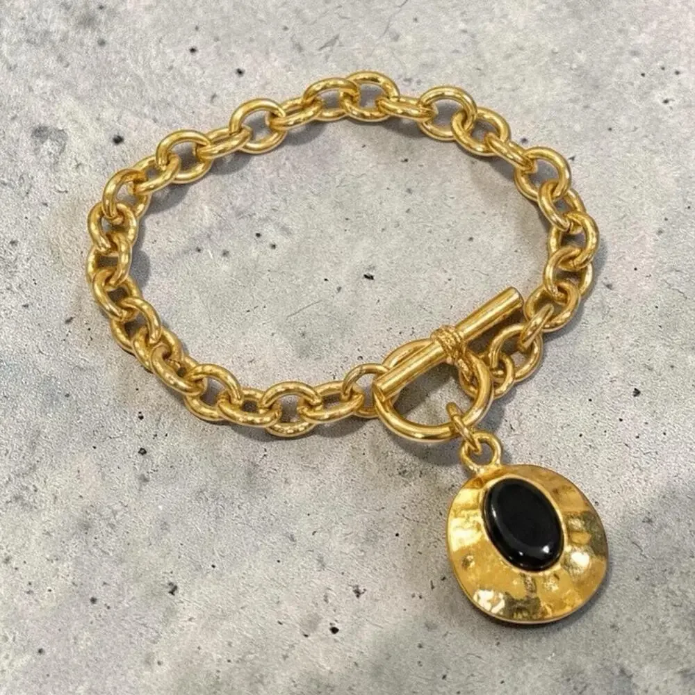 Vintage Avon Gold Tone Black Onyx 8 Inch Vintage Toggle Charm Bracelet